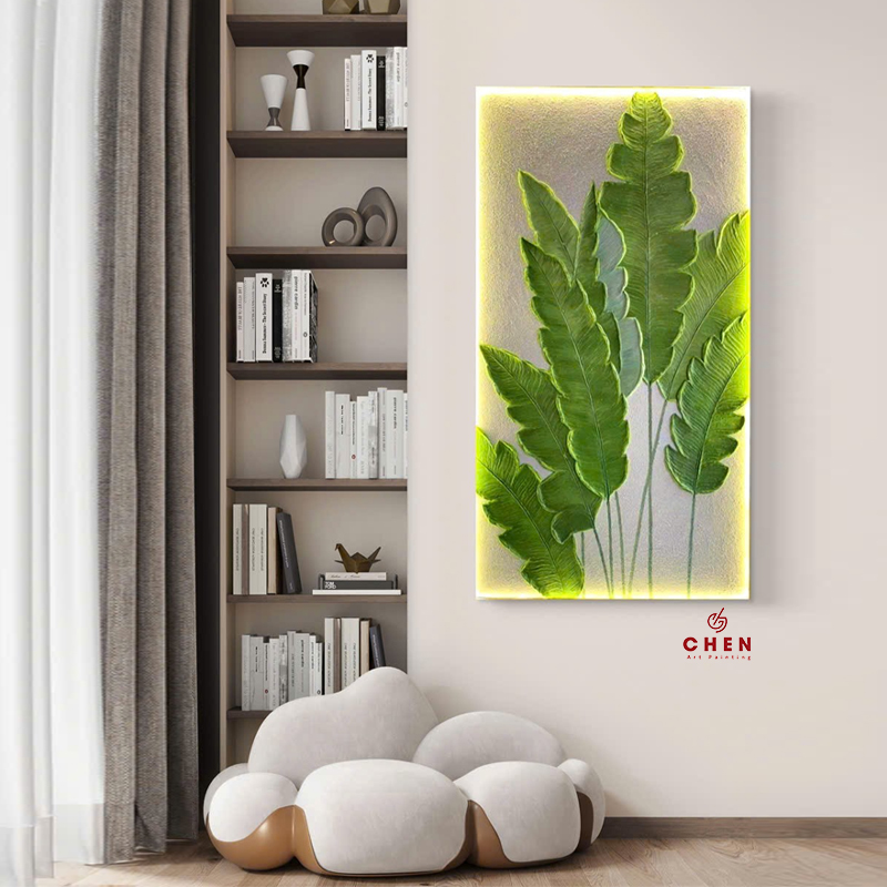 Tranh đắp nổi lá chuối nghệ thuật với ánh sáng nền vàng trang trí phòng khách hiện đại sang trọng